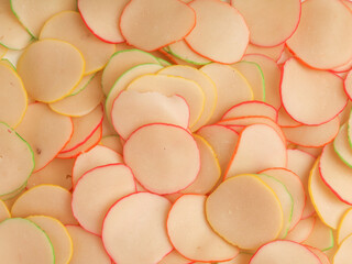 Heap of raw crackers on white background