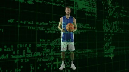 Upon lifting basketball, male athlete performing dribbles against code showcasing tech training - Powered by Adobe