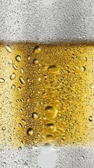 Close up of beer glass with condensation drops refreshing cold drink