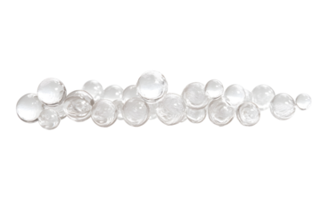 Cluster of hyaluronic acid bubbles varying in size with subtle reflections on their surfaces isolated on white background