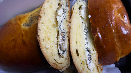 Close-Up of Freshly Baked Pastry with Cottage Cheese and Poppy Seed Filling.