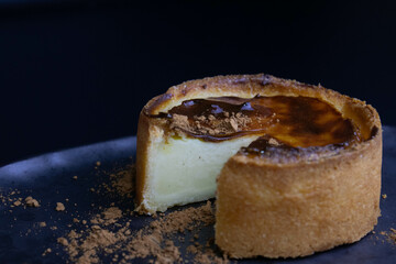 A rich, round baked French custard tart , Flan