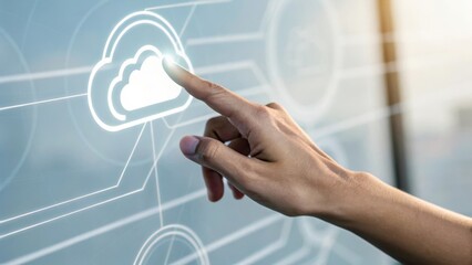 A hand touching a digital cloud icon on a futuristic interface.