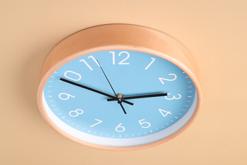 Close-up of a wall clock. The concept of time and work time is valuable for life, Alarm clock...