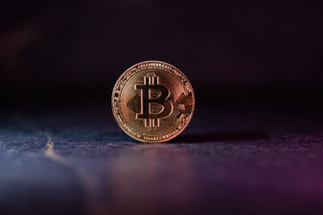 Bitcoin with Golden Glow Reflected on Surface