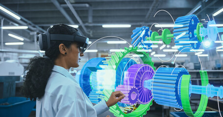 Female Engineer Wearing Ar Headset Works on a 3d Green Energy Engine Turbine Model in a High-tech...