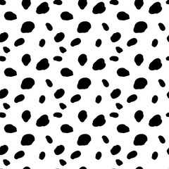 Fototapeta premium Irregular black dots pattern isolated on white background 