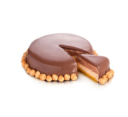 Ice cream cake with chocolate glaze with chocolate and hazelnut flavor on a sponge cake base
