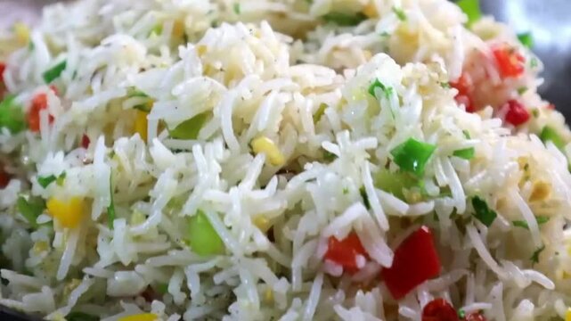 Fried rice with garlic flavor, cooked using long grain basmati rice and stir-fried fresh veggies &mdash; aromatic, colorful, spiced, perfect for Indo-Chinese meals, party platters, and styled food visuals.