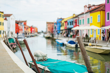 Vibrant houses lining the canals of Burano, Venice on a serene day