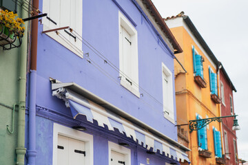 Charming pastel houses in Burano, Venice showcasing vibrant colors and detail