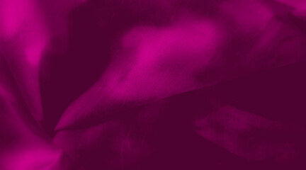 A collection of vibrant fabric textures with deep magenta hues. The folds and shadows create abstract patterns, evoking elegance and luxury with a soft, flowing appearance.