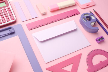 Stationery calculator ruler calculator and school stuff on coloured background. Concept of school...