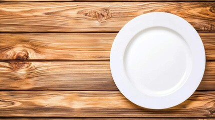 A white plate on a wooden table.