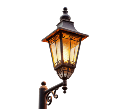 Elegant lantern lighting a rustic outdoor scene at dusk