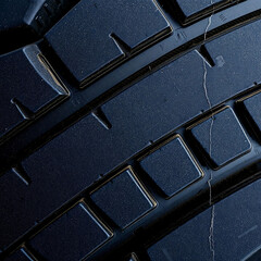 Weathered Tire Tread – Faded Rubber Surface with Dust and Cracks, Ultra Close-Up