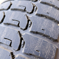 Weathered Tire Tread – Faded Rubber Surface with Dust and Cracks, Ultra Close-Up