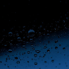 Black Glass Surface with Water Droplets – Reflective Macro Texture in Moody Lighting