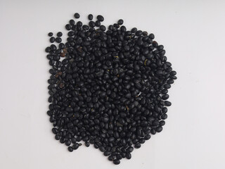 Heap of soy beans on white background