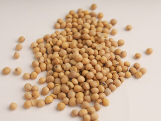 Heap of soy beans on white background