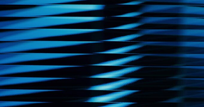 Abstract background. The blue stripes shimmer on the black horizontal stripes.