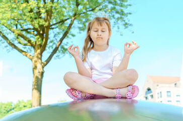 young woman doing yoga exercises