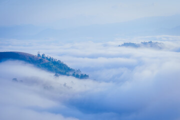 The beautiful natural landscape is a sea of mist in the morning, the movement of the fog covering the Mountain—tourism to enjoy the natural beauty of Mae Chaem, Chiang Mai, Northern Thailand.