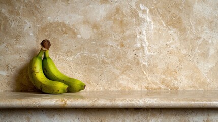 A bunch of green bananas on a marble shelf.