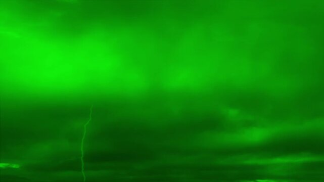 Time-lapse of dramatic sky and bad weather with dark clouds and lightning on green screen background