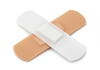 Two adhesive bandages crossed isolated on white background