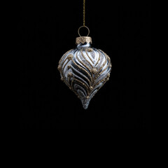 Beautiful decorative ornament hanging in darkness