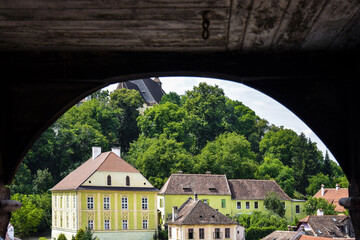 Picturesque view of old houses with tiled attic roofs, chimneys and windows. Architecture of ancient city. Copy space. Selective focus.
