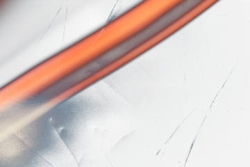 retro film overlay effect with scratch dust and light leaks,retro grain noisy film distressed texture light leak flare on black background