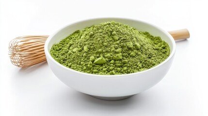 Matcha powder in bowl with bamboo whisk