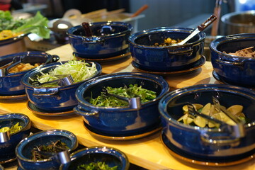 various additives in the soup buffet greens sprouted beans meat and pepper salt and other. High quality 