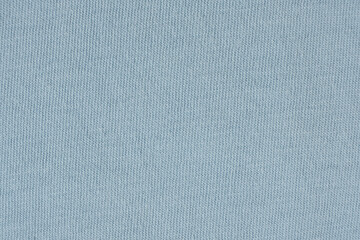 Macro texture of a fabric consisting of one hundred percent cotton.