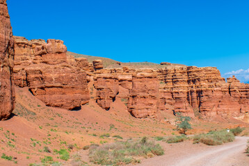 Charyn Canyon, Valley of Castles. The excellence of Kazakhstan. Panorama of natural unusual landscape. The red canyon of extraordinary beauty looks like a Martian landscape.