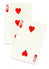 A pair of playing cards of the same suit isolated on a white background.