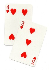 A pair of playing cards of the same suit isolated on a white background.