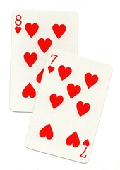 A pair of playing cards of the same suit isolated on a white background.