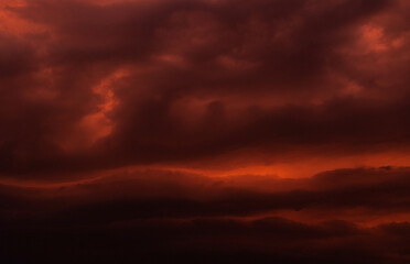 Crimson sunset fantastic sky before thunderstorm