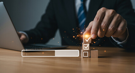 A person typing on a laptop with digital security icons overlayed on the screen and surrounding the laptop