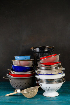 A collection of colanders and strainers 