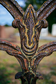 Wrought iron work with chippy paint in an old cemetery 