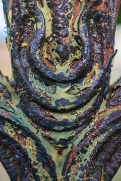 Wrought iron work with chippy paint in an old cemetery 