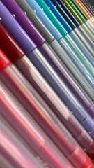 Colorful arrangement of writing instruments in a creative workspace during daylight hours