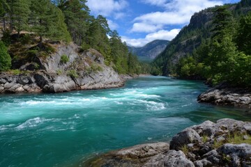 Clear turquoise river flows between rocky banks under a bright blue sky