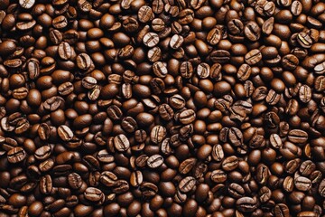 Obraz premium Roasted coffee beans background texture image