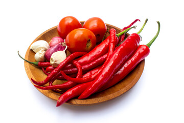 Red chili peppers and other spices to make chili paste. Chilli paste is a condiment made from...