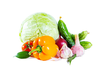 Mix of colorful vegetables - bell pepper, cabbage, tomatoes, cucumbers, onions and garlic.